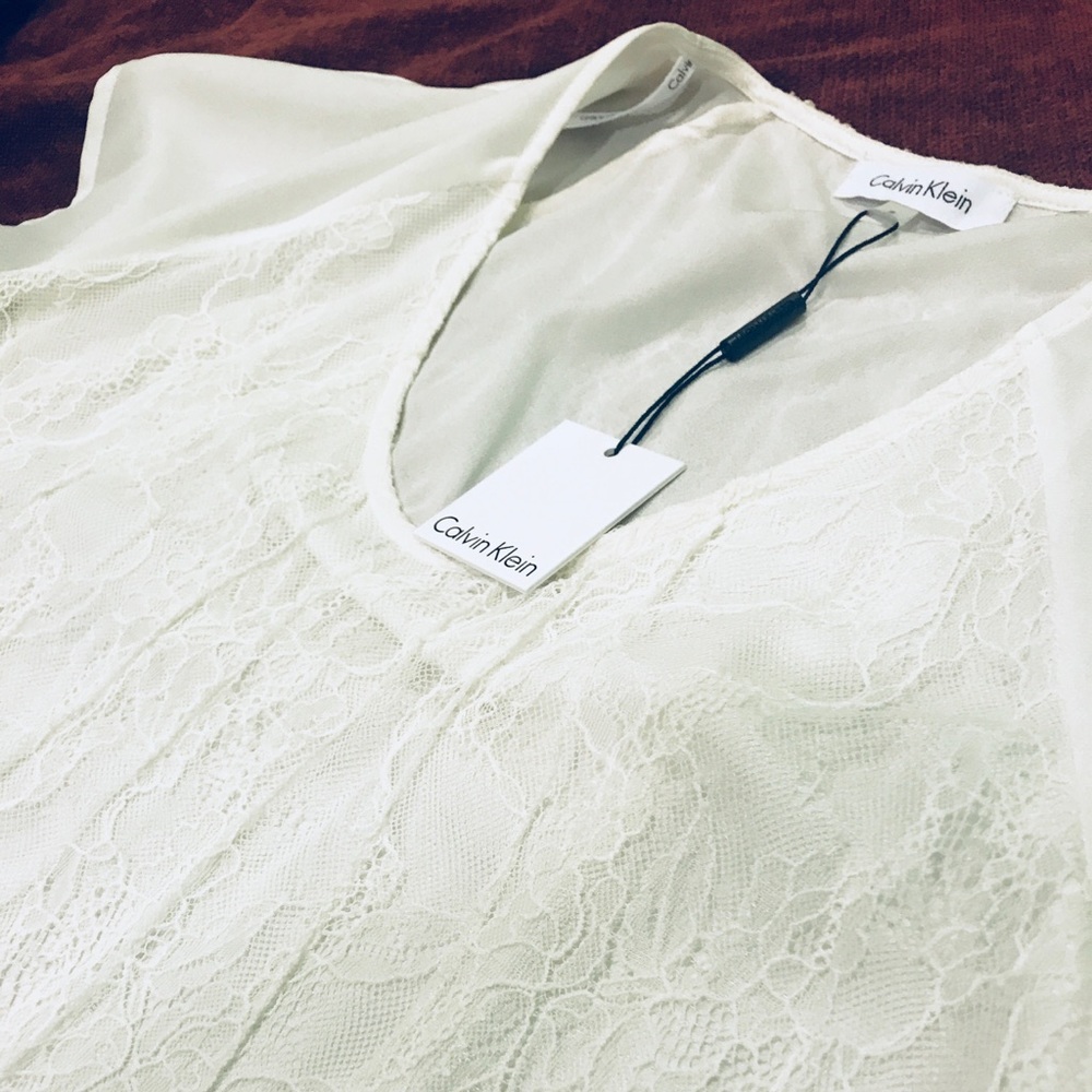 Calvin Klein white laced shirt. Tags still on!